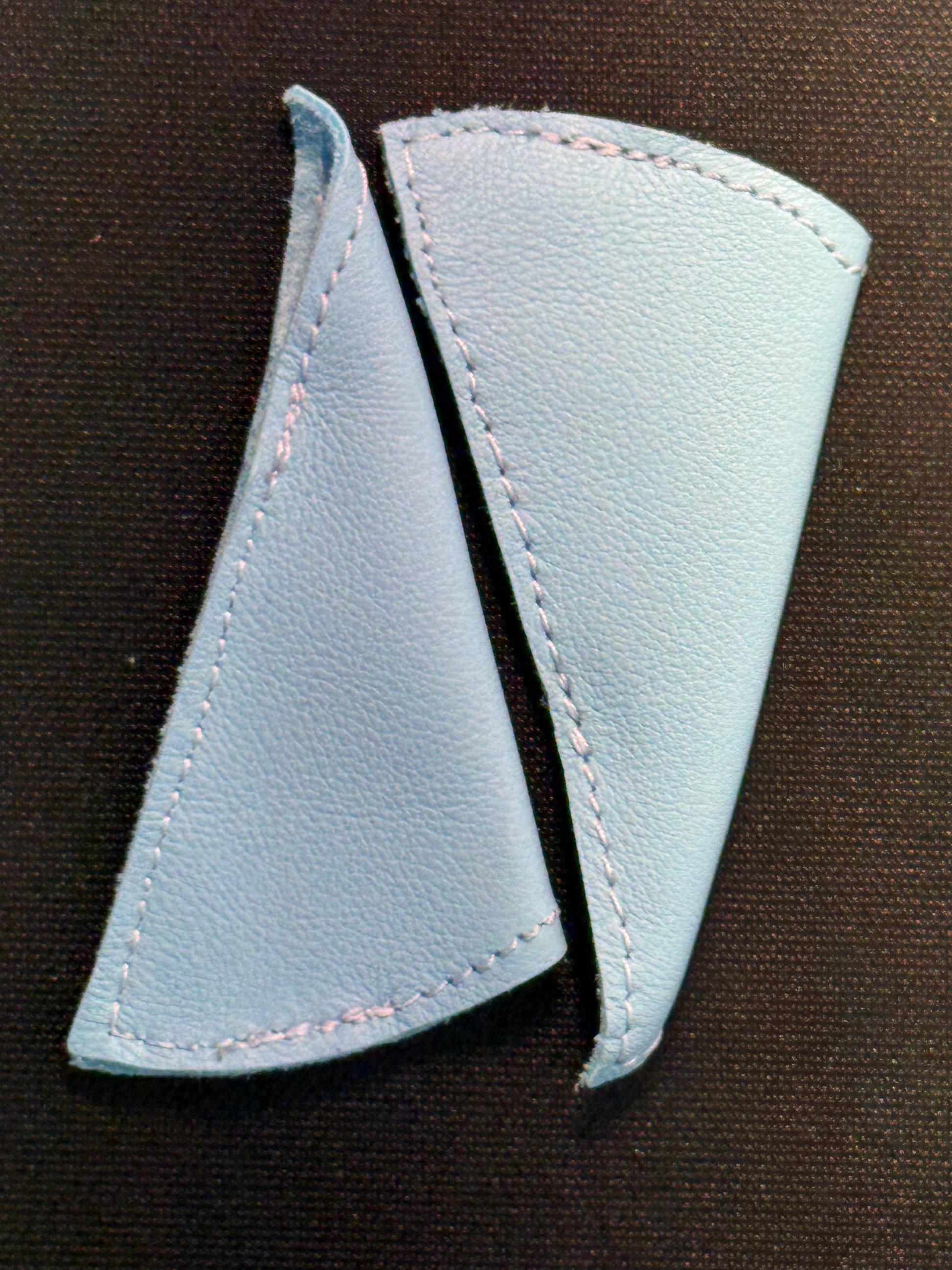 These banner shields are made of soft blue leather 